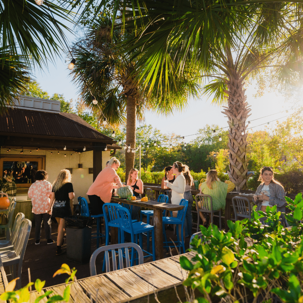 Guests in an outdoor seating area at Tower7.